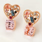 Pink heart stud earrings with CZ cube drop